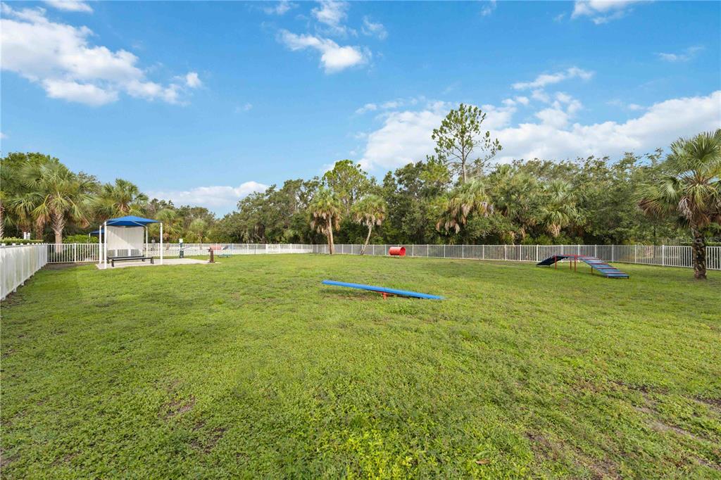 12252 Stuart Drive Venice, FL 34293 - Photo 52 of 70 a view of a green field
