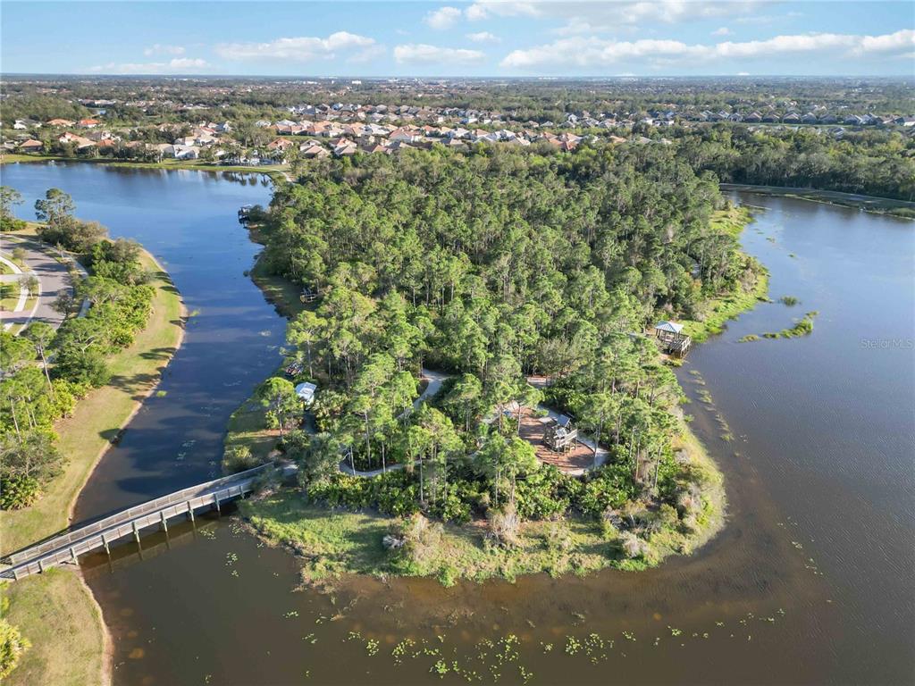 12252 Stuart Drive Venice, FL 34293 - Photo 61 of 70 a view of a lake with a city