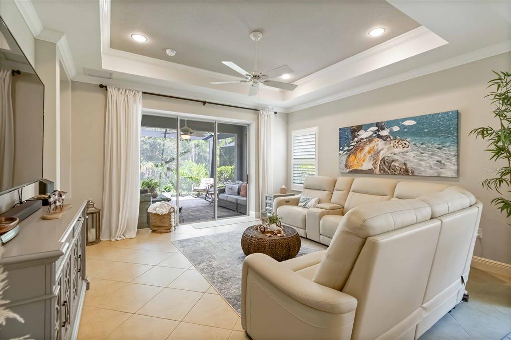 12252 Stuart Drive Venice, FL 34293 - Photo 9 of 70 a living room with furniture and a large window