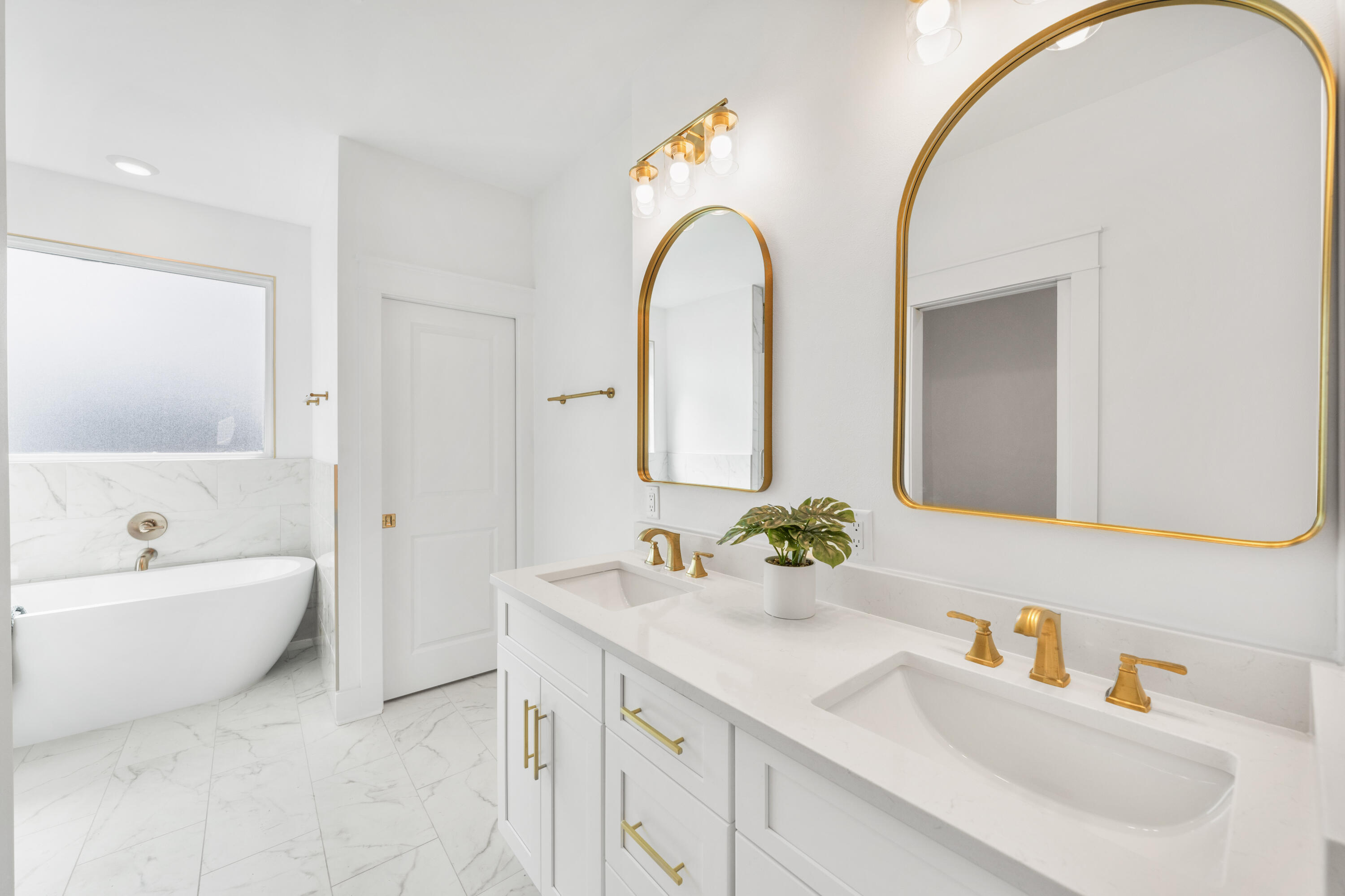 104 Fletcher Way Destin, FL 32541 - Photo 30 of 59 a bathroom with a sink and a mirror