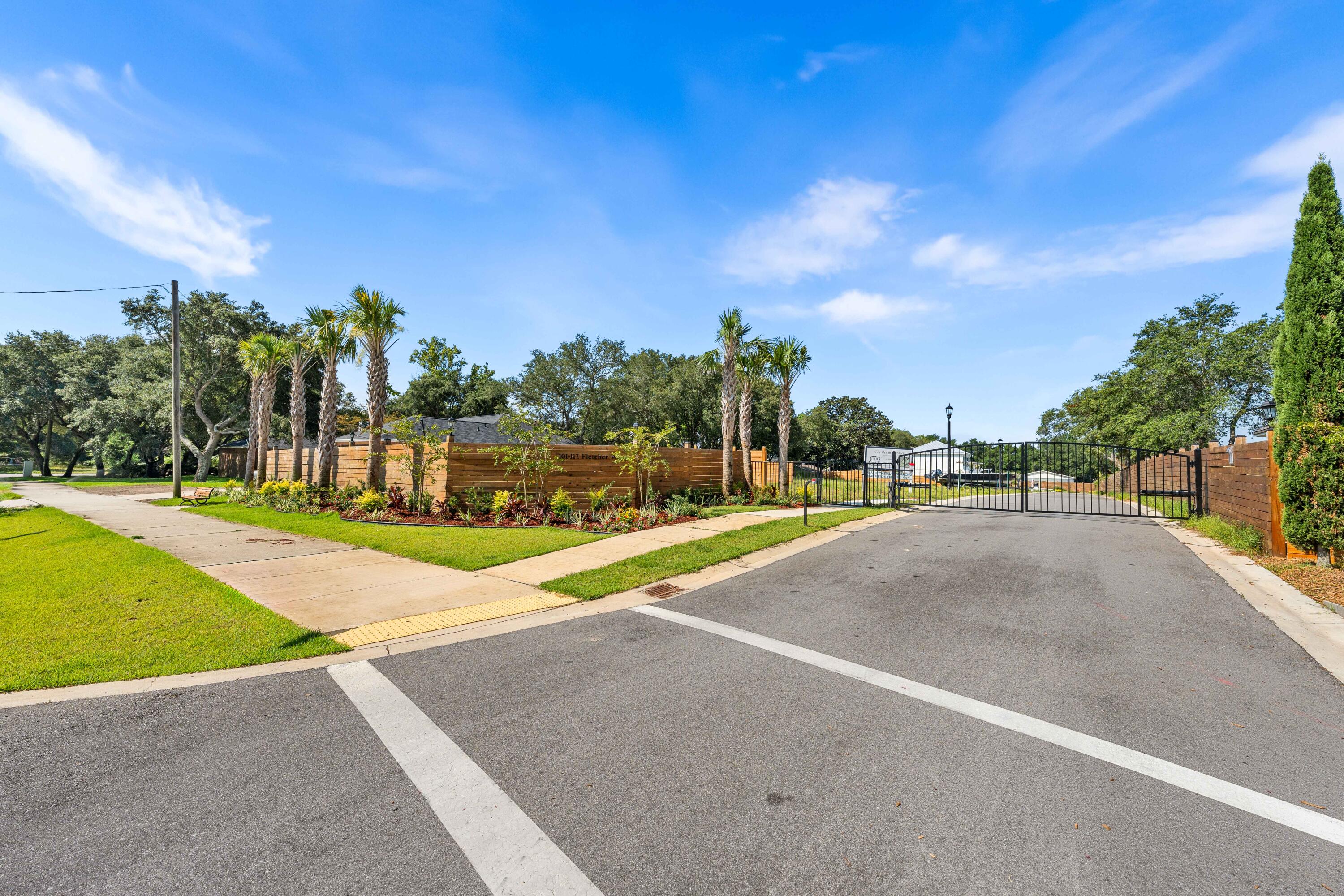 104 Fletcher Way Destin, FL 32541 - Photo 46 of 59 a view of a street with a houses
