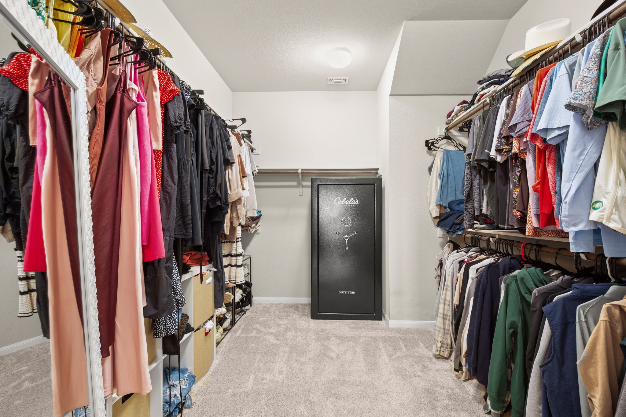 6520 Ranchito Drive Austin, TX 78744 - Photo 18 of 40 a view of walk in closet with clothes