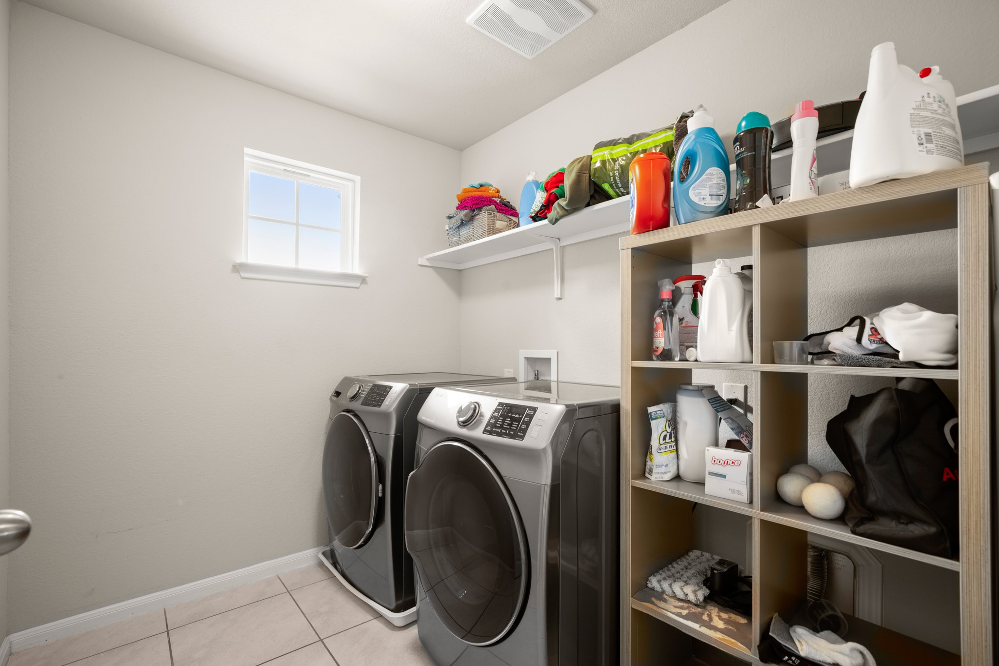 6520 Ranchito Drive Austin, TX 78744 - Photo 21 of 40 a utility room with dryer and washer