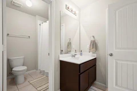 a view of a hallway with a livingroom