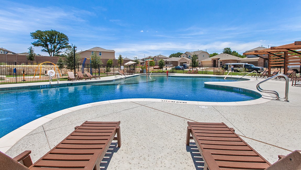 6520 Ranchito Drive Austin, TX 78744 - Photo 39 of 40 a view of a swimming pool with outdoor seating