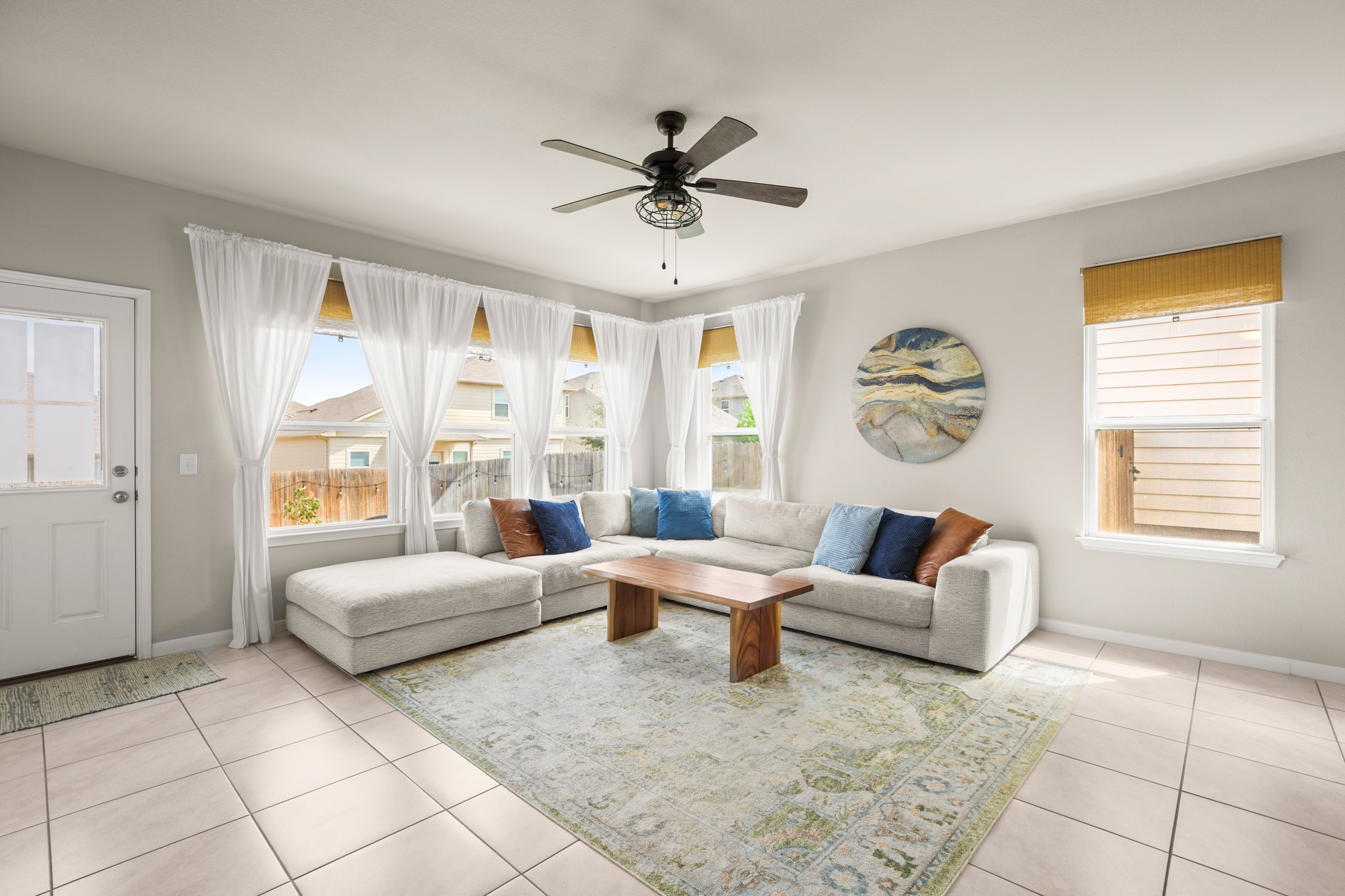 6520 Ranchito Drive Austin, TX 78744 - Photo 5 of 40 a living room with furniture and a large window