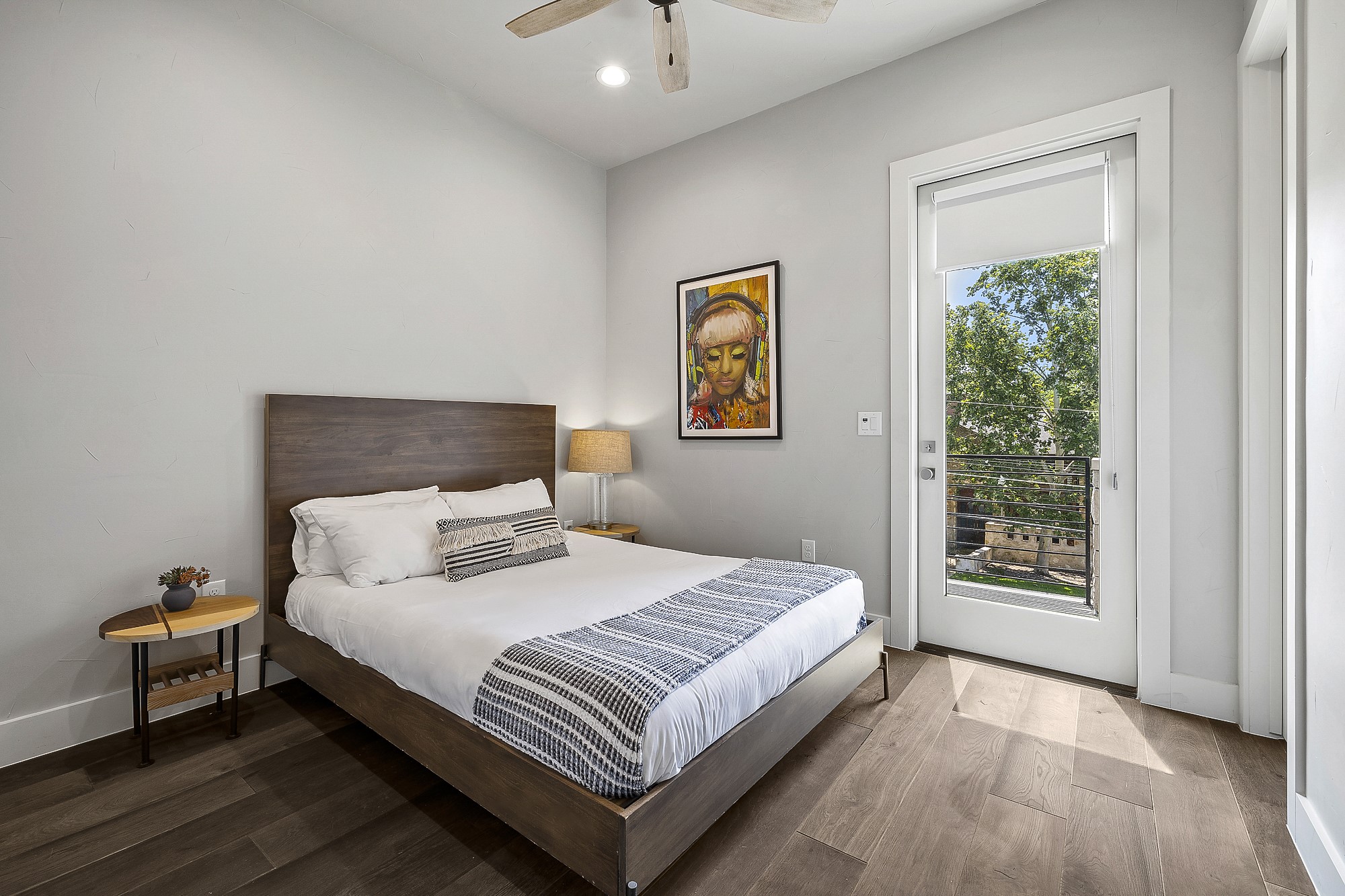 2414 Kinney Road Austin, TX 78704 - Photo 21 of 40 a bedroom with a bed and a window