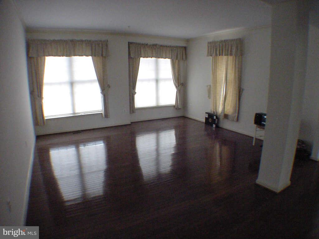 2430 Rippling Brook Road Frederick, MD 21701 - Photo 9 of 30 a view of empty room with wooden floor and fan