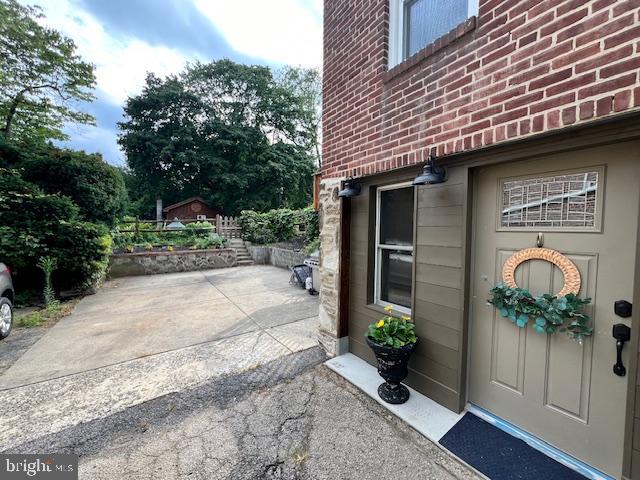 2128 Jenkintown Road Glenside, PA 19038 - Photo 27 of 29 Basement Entry from Driveway