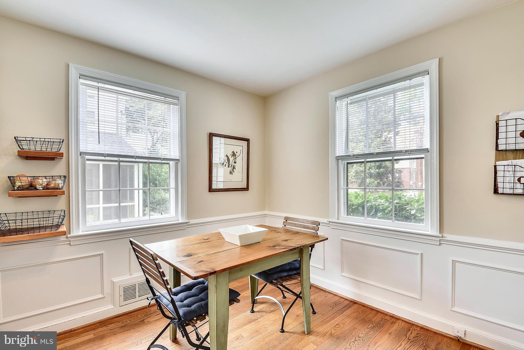 9310 Glenville Road Silver Spring, MD 20901 - Photo 3 of 30 Handsome panel wainscoting graces the dining room