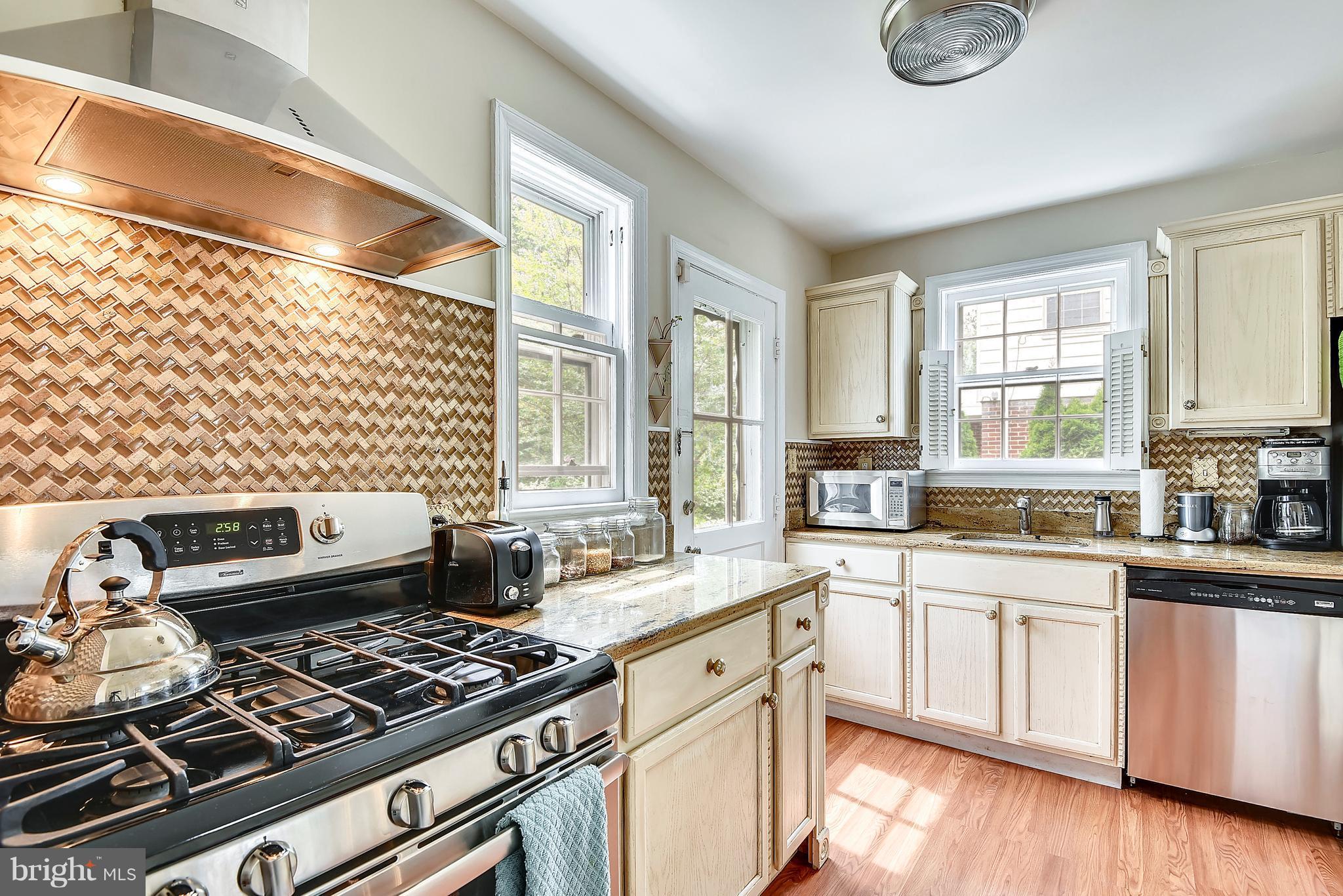 9310 Glenville Road Silver Spring, MD 20901 - Photo 8 of 30 SS appliances and loads of light in this kitchen