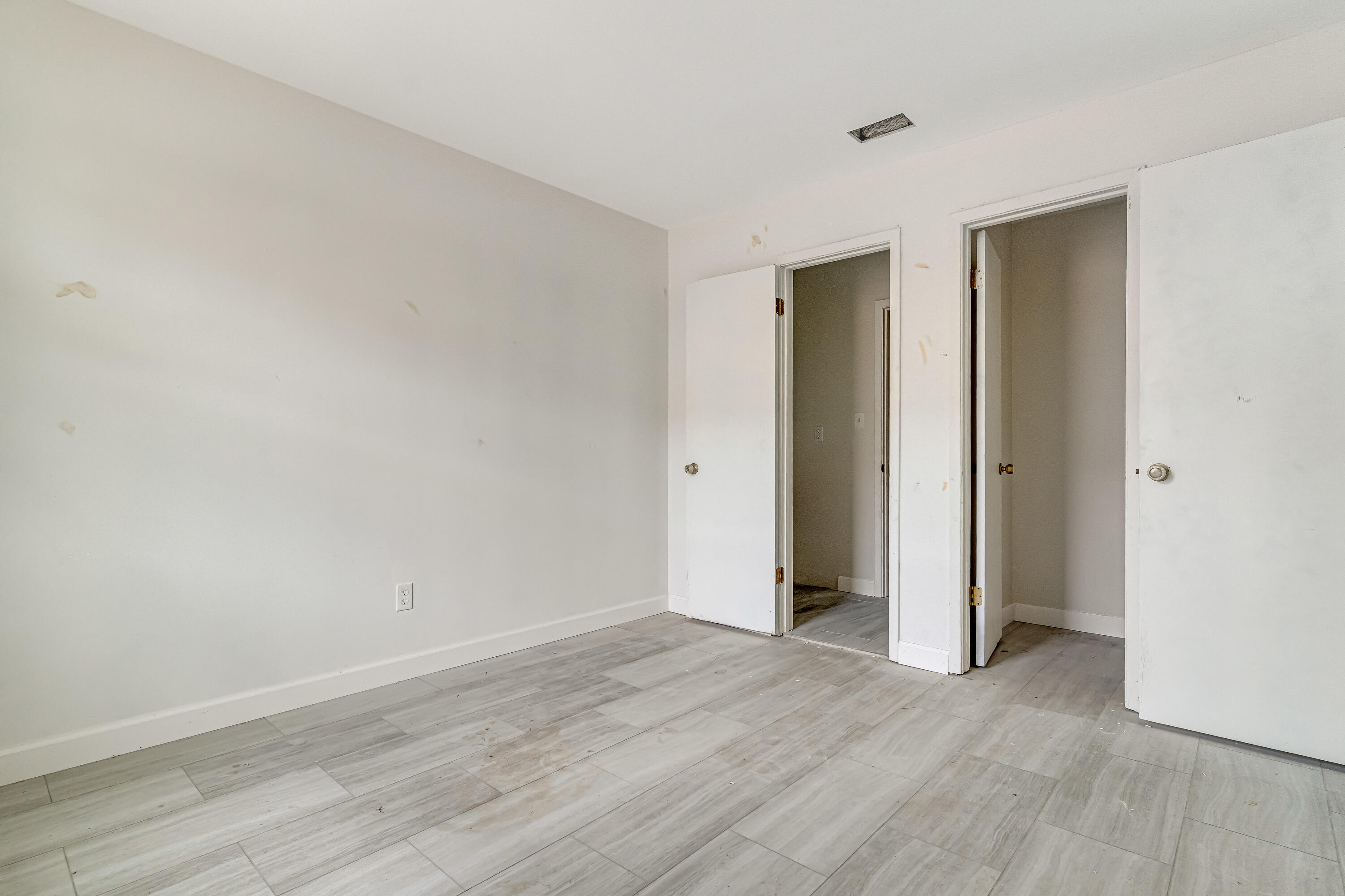 113 Cedar Avenue Southwest, Unit A Fort Walton Beach, FL 32548 - Photo 11 of 32 a view of an empty room with wooden floor