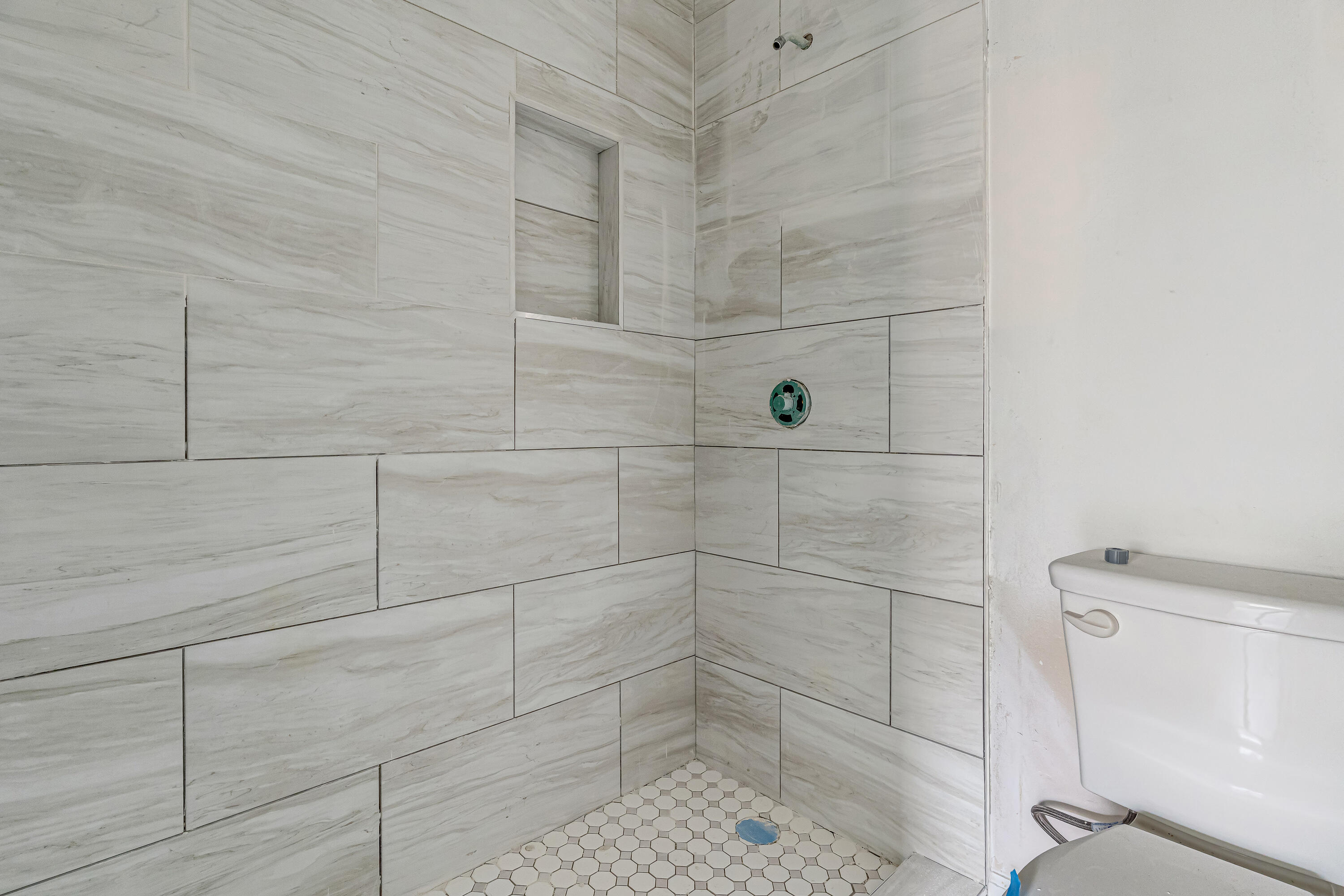 113 Cedar Avenue Southwest, Unit A Fort Walton Beach, FL 32548 - Photo 16 of 32 a bathroom with a shower