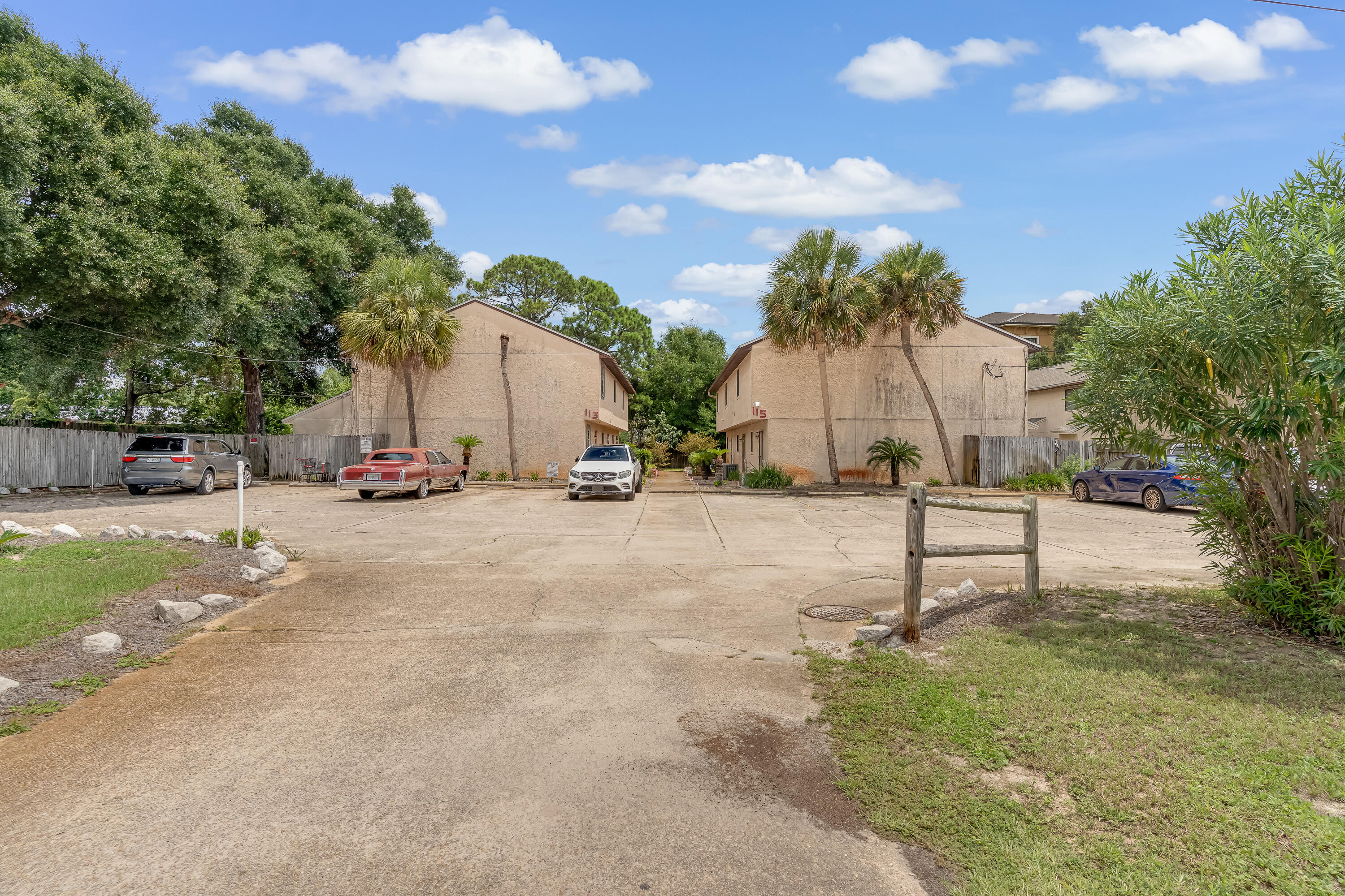 113 Cedar Avenue Southwest, Unit A Fort Walton Beach, FL 32548 - Photo 22 of 32 a view of street with palm trees