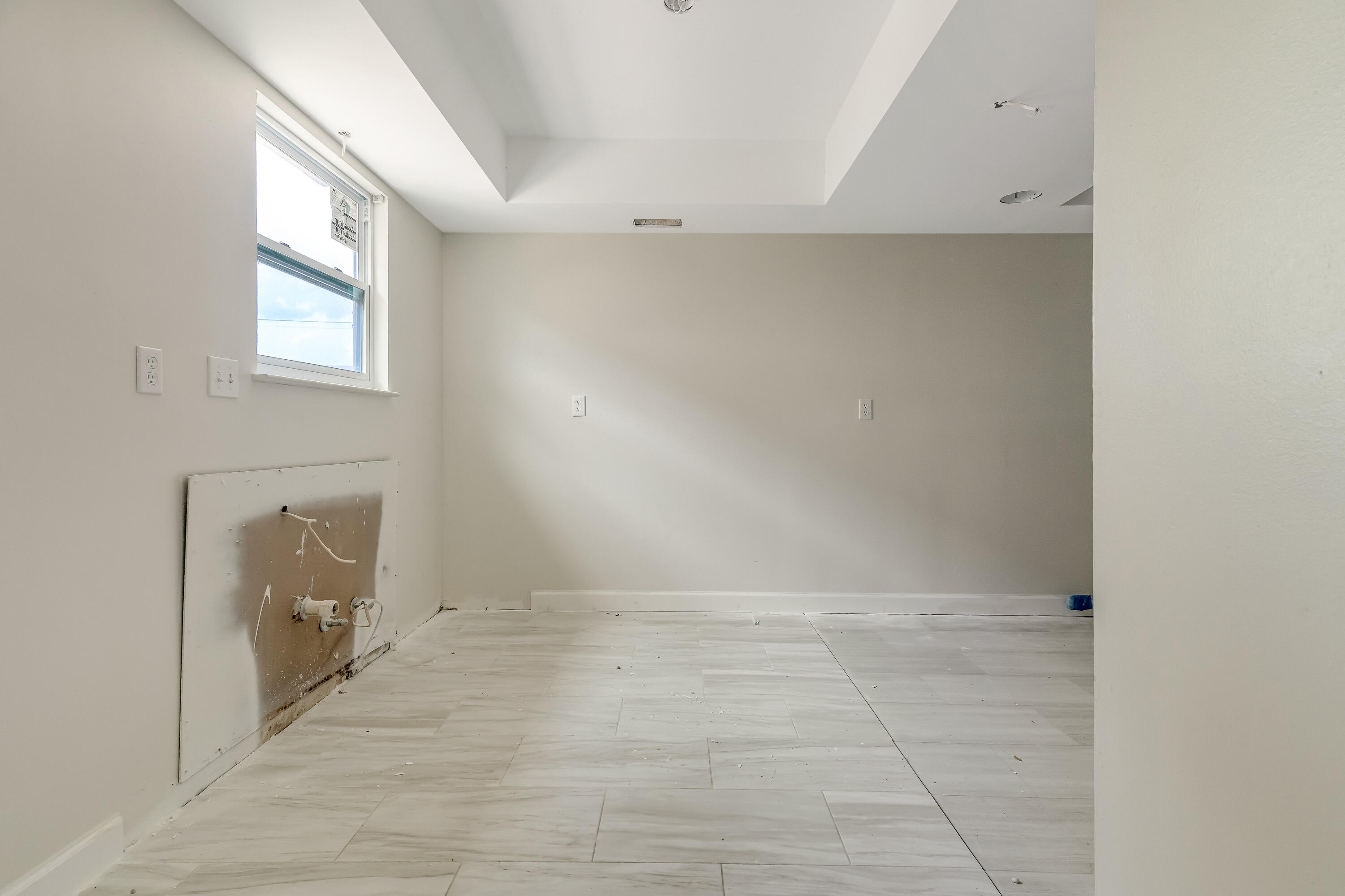113 Cedar Avenue Southwest, Unit A Fort Walton Beach, FL 32548 - Photo 5 of 32 a view of an empty room with a window