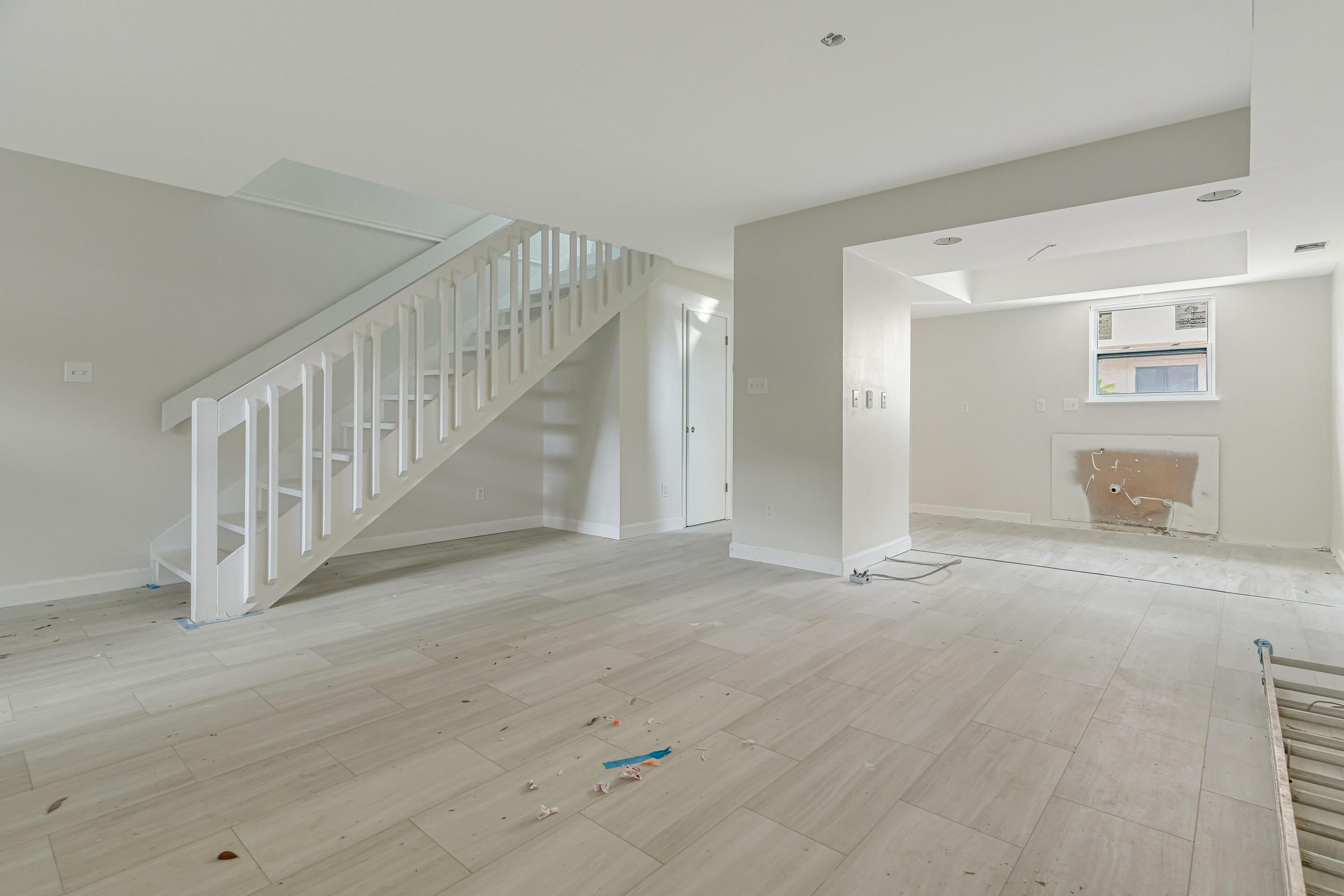 113 Cedar Avenue Southwest, Unit A Fort Walton Beach, FL 32548 - Photo 8 of 32 a view of an empty room with wooden floor