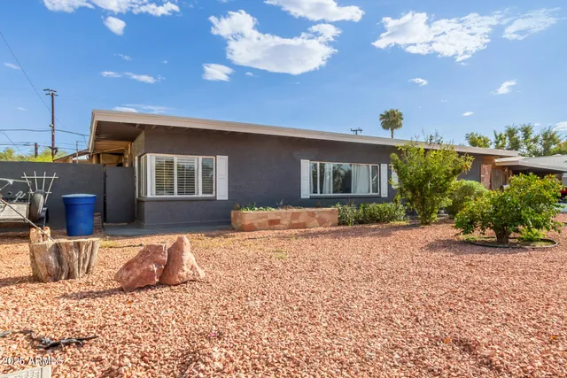 a view of a house with a patio