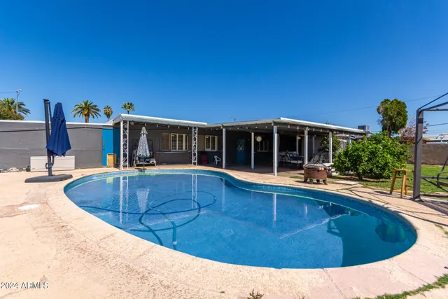 a view of outdoor space yard swimming pool and patio