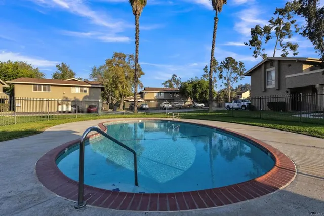 an aerial view of house with yard