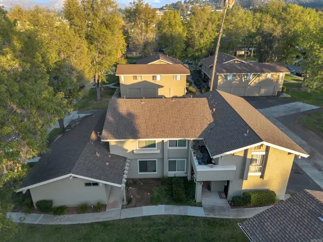 an aerial view of residential house with parking space