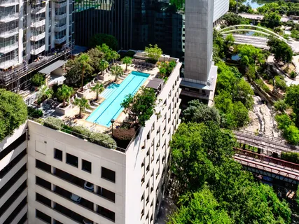 a view of city from balcony having outdoor seating