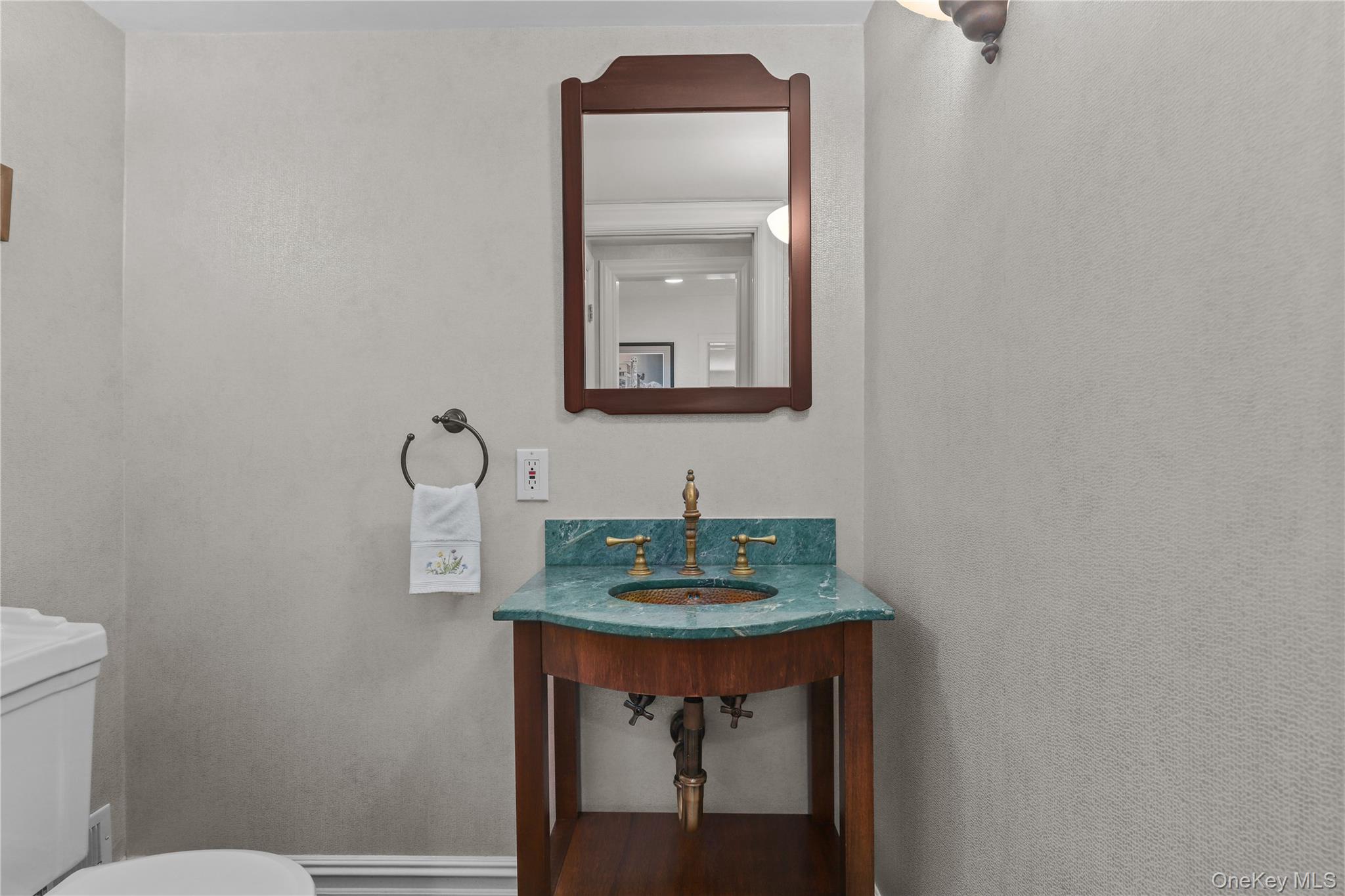 12 Sunnybrae Place Bronxville, NY 10708 - Photo 12 of 40 Half bath featuring toilet and vanity
