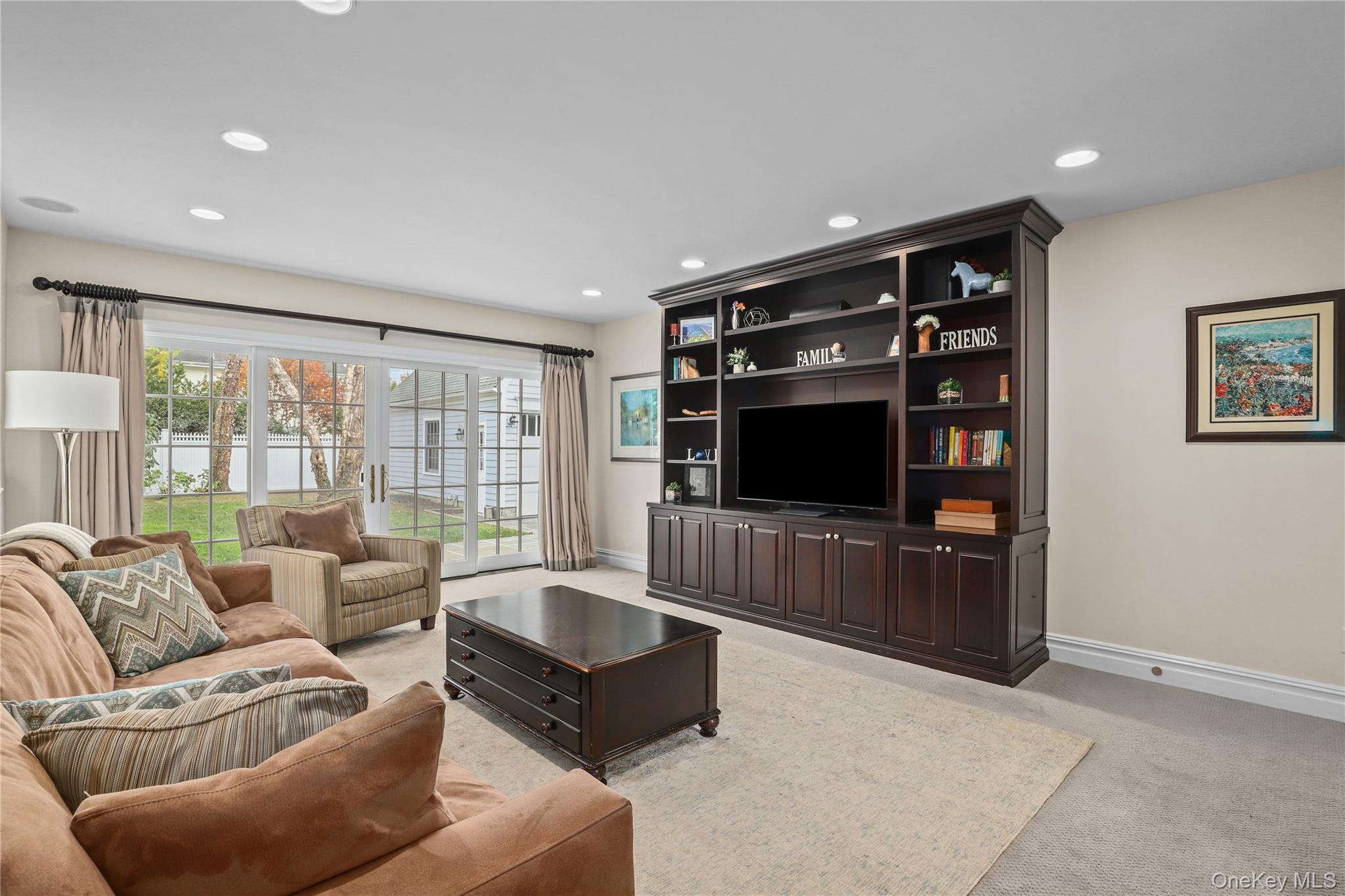 12 Sunnybrae Place Bronxville, NY 10708 - Photo 6 of 40 Family room with carpet and recessed lighting