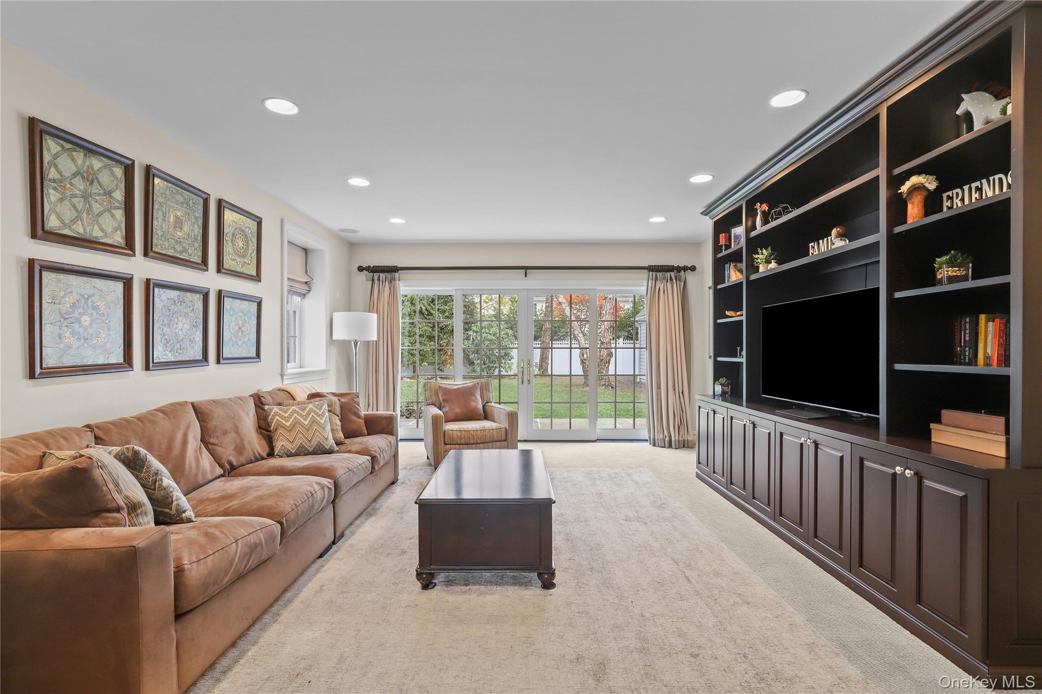 12 Sunnybrae Place Bronxville, NY 10708 - Photo 7 of 40 Family room with carpet and recessed lighting