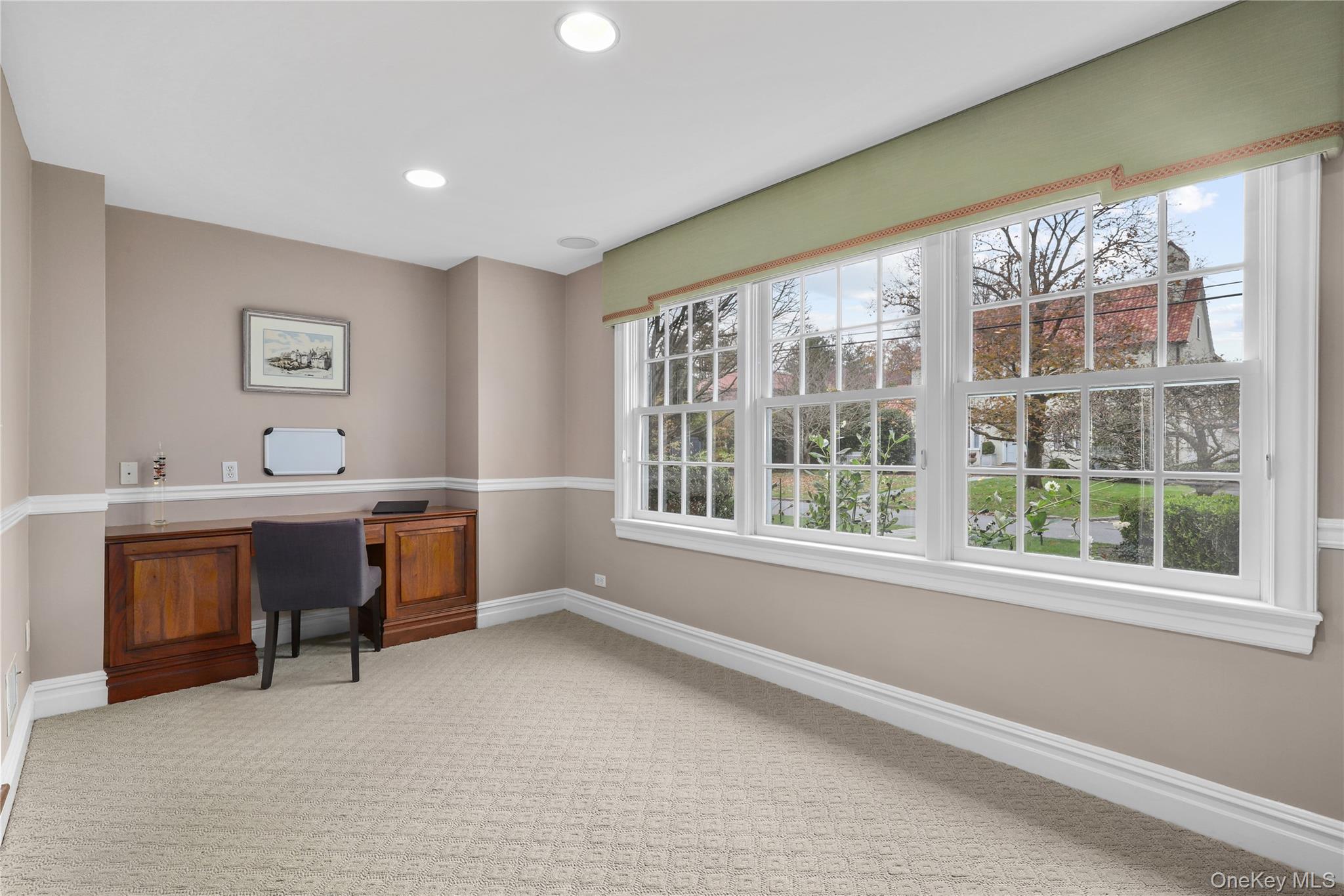 12 Sunnybrae Place Bronxville, NY 10708 - Photo 10 of 40 Sunroom / office with carpet, recessed lighting, and built in study area