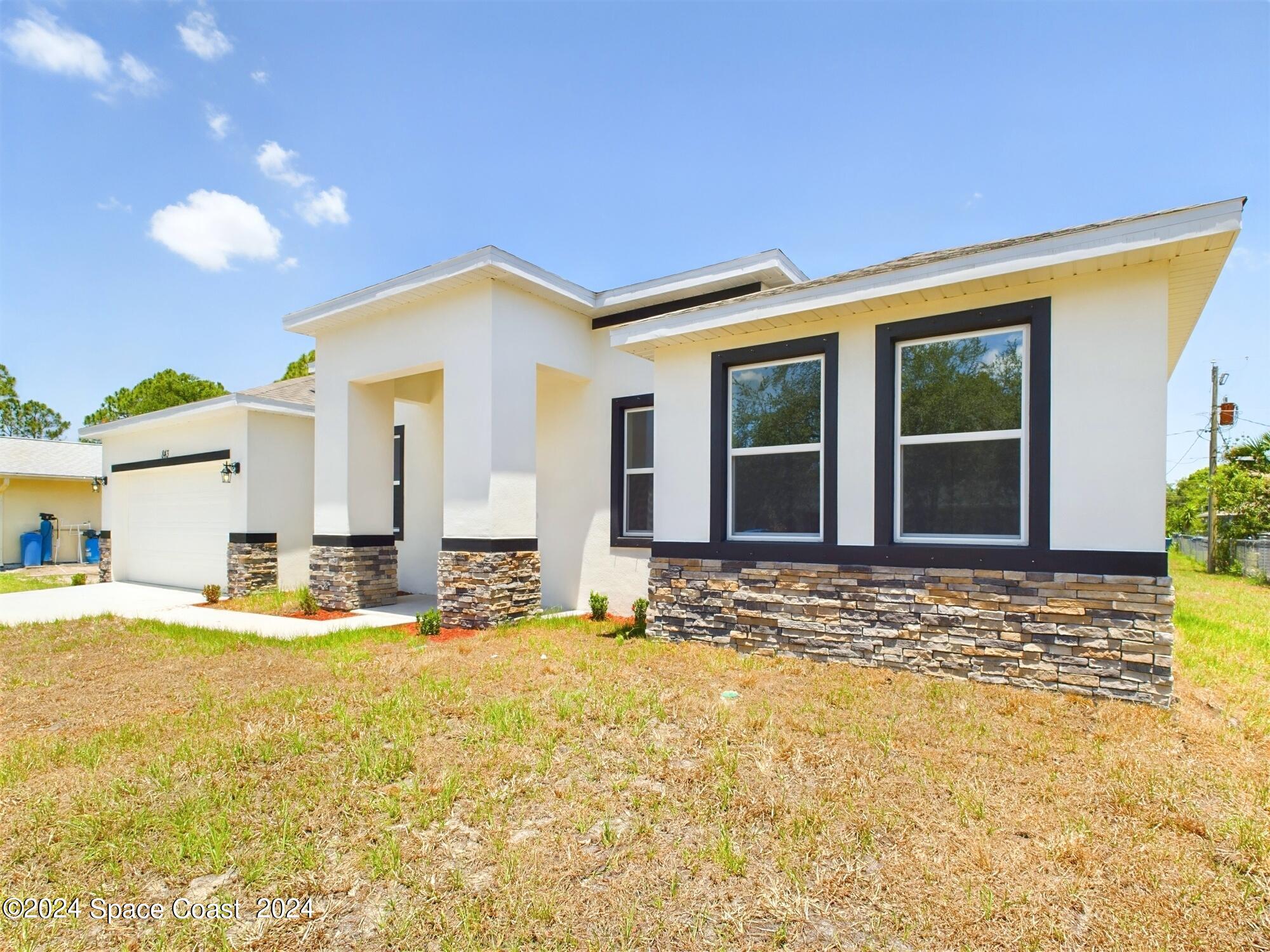 262 Trilby Road Southwest Palm Bay, FL 32908 - Photo 5 of 48 CAM03399G0-PR0030-STILL049