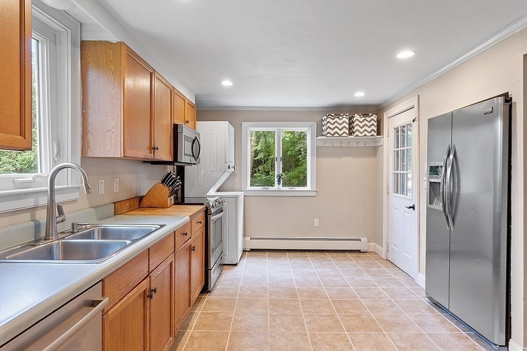 203 Stow Road Harvard, MA 01451 - Photo 15 of 42 a kitchen with a sink refrigerator and window