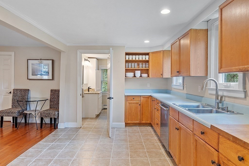 203 Stow Road Harvard, MA 01451 - Photo 17 of 42 a large kitchen with stainless steel appliances granite countertop a sink and cabinets