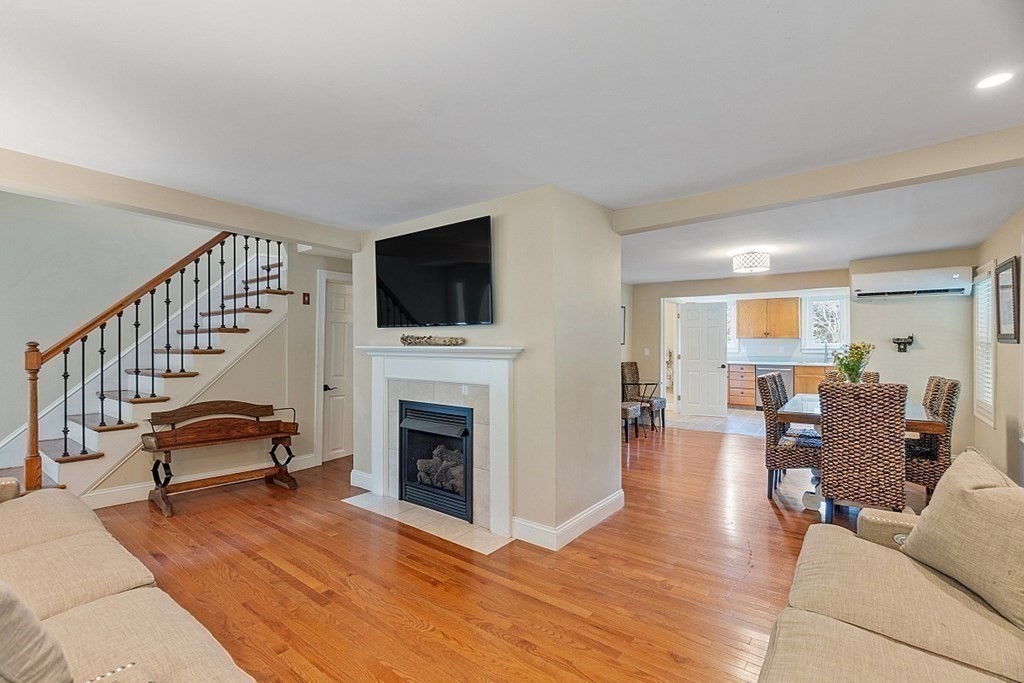 203 Stow Road Harvard, MA 01451 - Photo 5 of 42 a living room with furniture and a fireplace