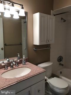 72 Shannon Road North Wales, PA 19454 - Photo 9 of 14 a bathroom with a granite countertop sink toilet and mirror