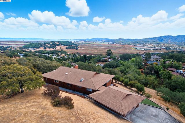 an aerial view of a house with a garden