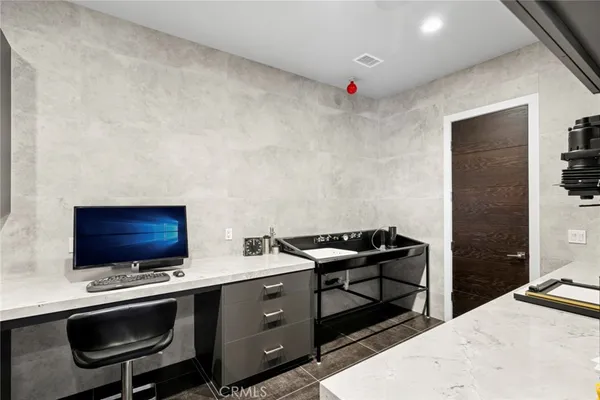 an aerial view of multiple houses with yard