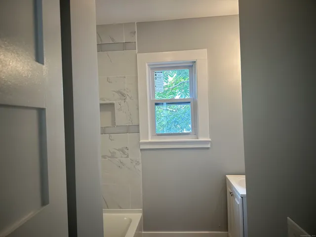 a bathroom with a window