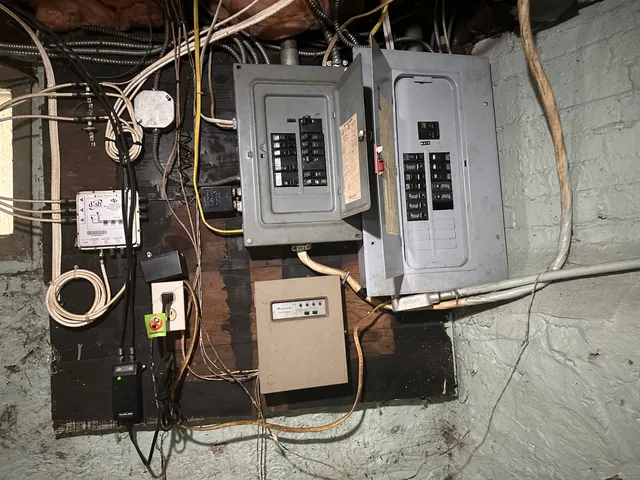 a view of water heater room with two chair