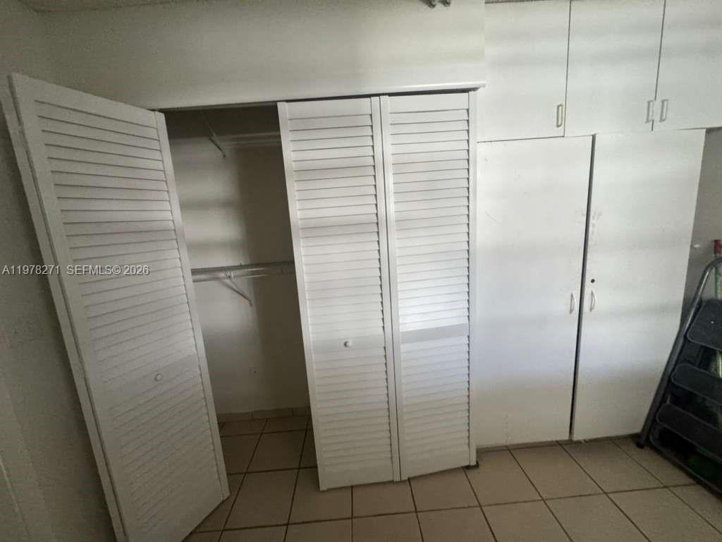 252 Northwest 48th Place, Unit 252 Miami, FL 33126 - Photo 14 of 15 a view of an empty room