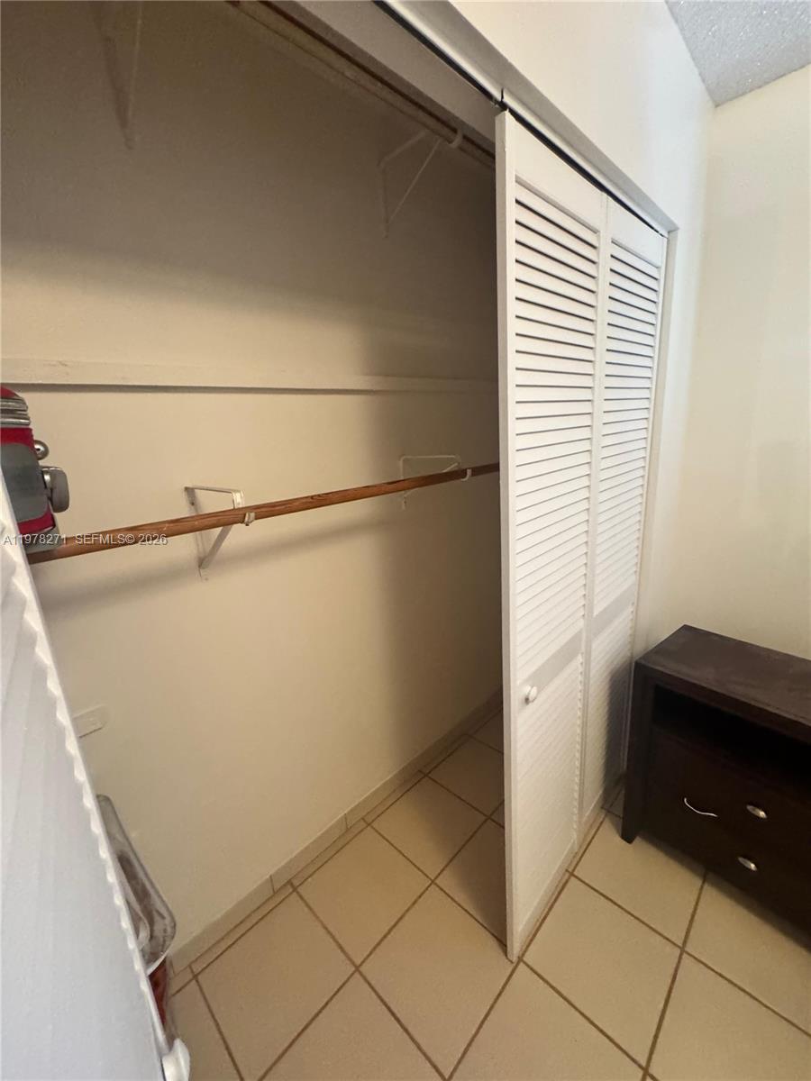 252 Northwest 48th Place, Unit 252 Miami, FL 33126 - Photo 9 of 15 a view of a kitchen