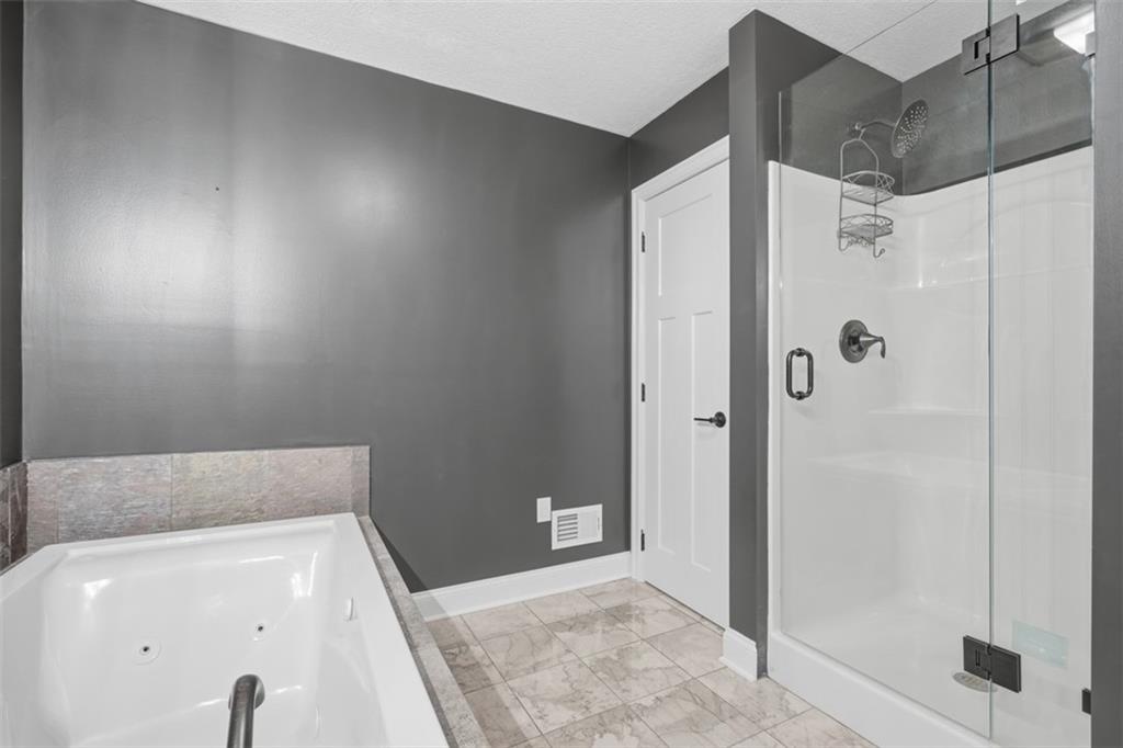 494 Ross Road Eighty Four, PA 15330 - Photo 35 of 50 Upper level full bath with separate tub and shower large closet