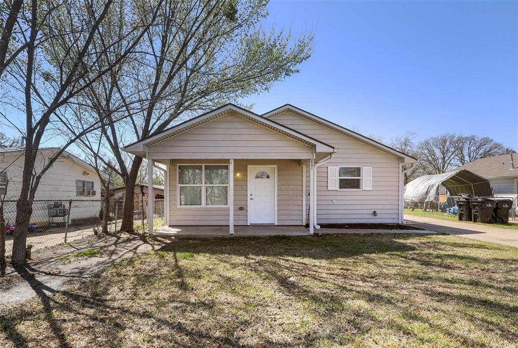 801 North 8th Avenue Denison, TX 75021 - Photo 1 of 1 a view of a house with a yard