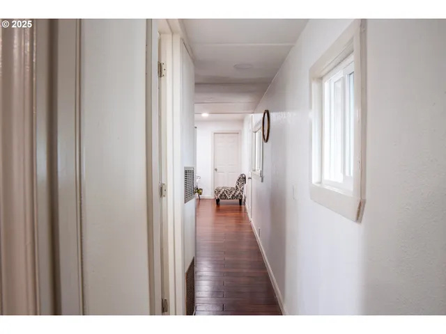 a view of entryway with wooden floor
