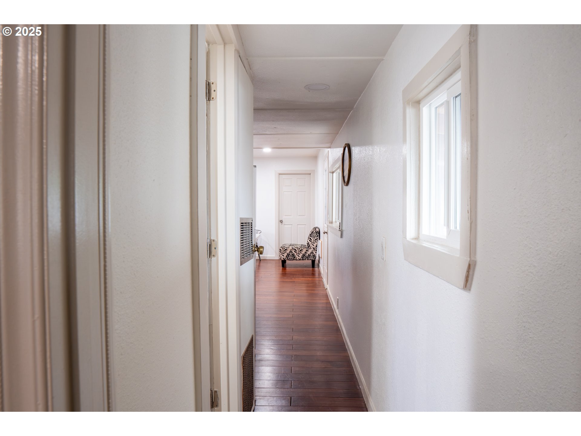 11803 Southeast Division Street, Unit 38 Portland, OR 97266 - Photo 12 of 24 a view of entryway with wooden floor
