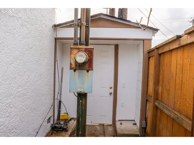 a view of entryway with wooden floor