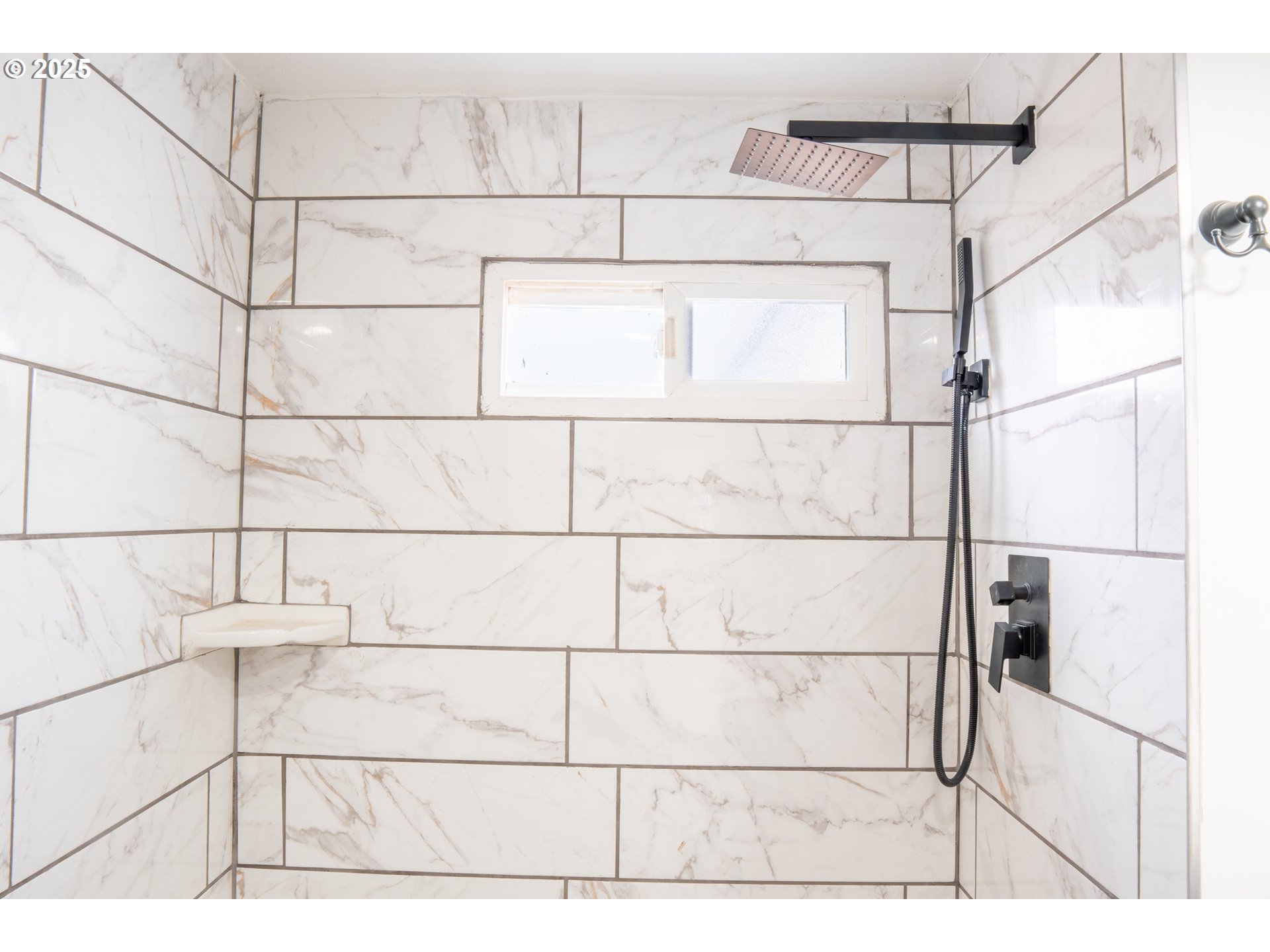 11803 Southeast Division Street, Unit 38 Portland, OR 97266 - Photo 8 of 24 a picture of a bathroom with a shower