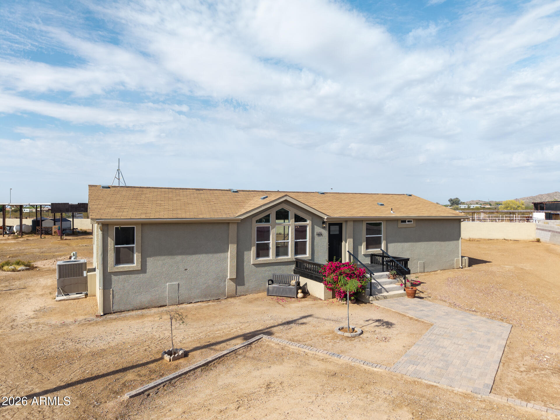 10290 North Katsina Road Casa Grande, AZ 85122 - Photo 2 of 51 a view of house with swimming pool and sitting space