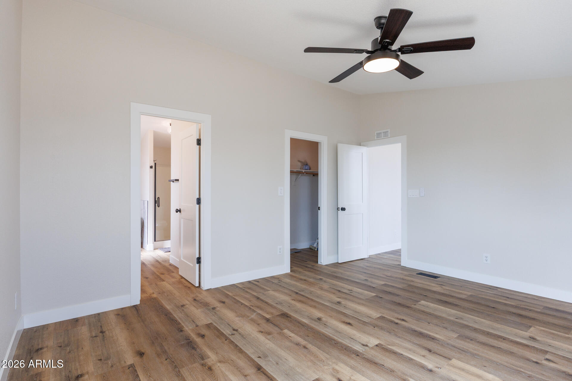 10290 North Katsina Road Casa Grande, AZ 85122 - Photo 22 of 51 a view of empty room with wooden floor
