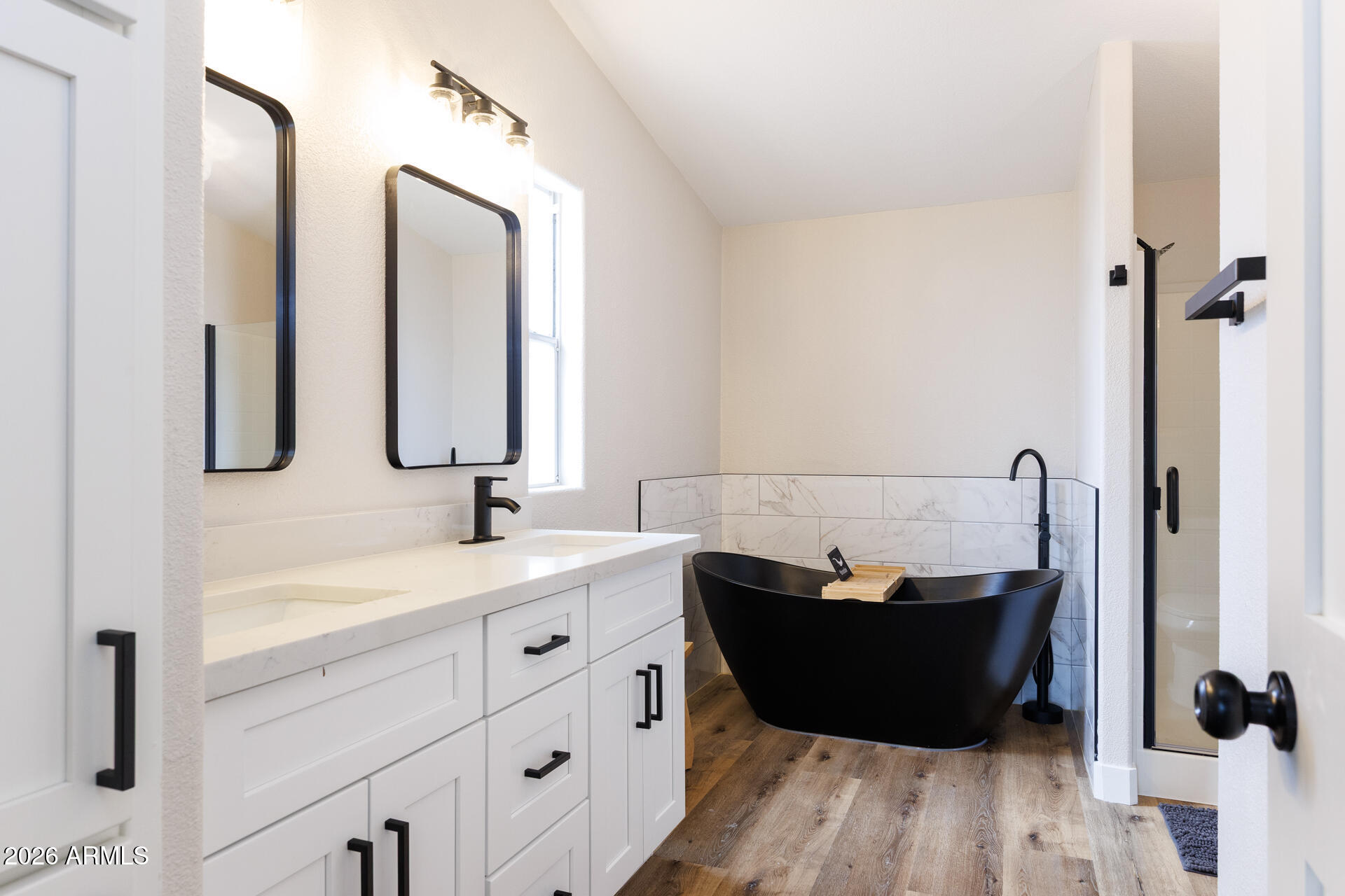 10290 North Katsina Road Casa Grande, AZ 85122 - Photo 24 of 51 a bathroom with a double vanity sink and mirror