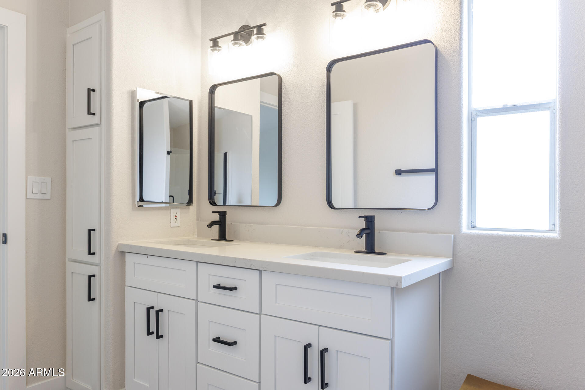 10290 North Katsina Road Casa Grande, AZ 85122 - Photo 25 of 51 a bathroom with double vanity sinks and a mirror